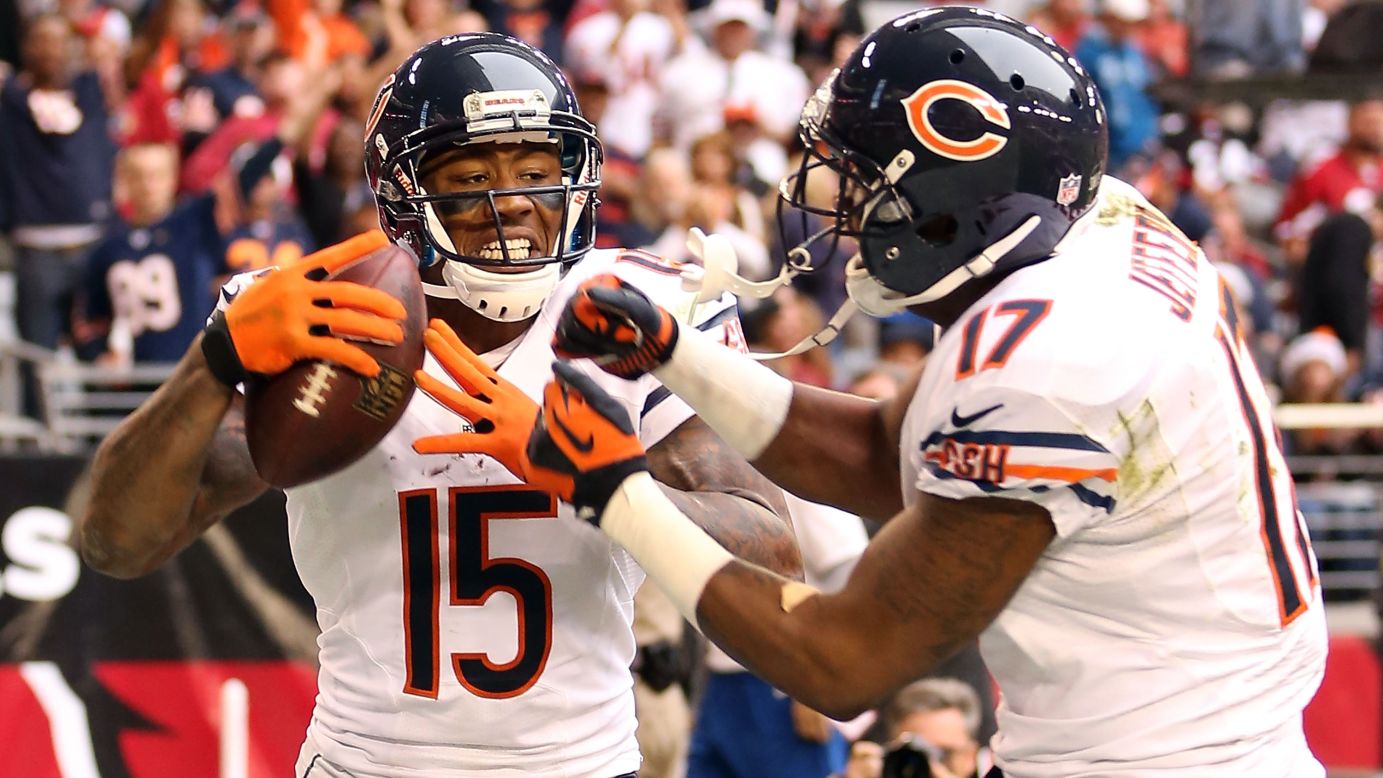 Wide receiver Brandon Marshall of the Bears celebrates with wide receiver Alshon Jeffery after a 11-yard touchdown reception against the Cardinals during the second quarter on Sunday.