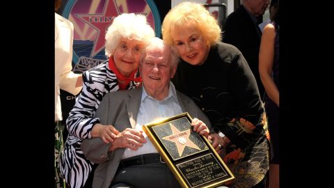 Durning poses with Charlotte Rae, left, and Doris Roberts, right, while being honored with a star on the Hollywood Walk of Fame on July 31, 2008.