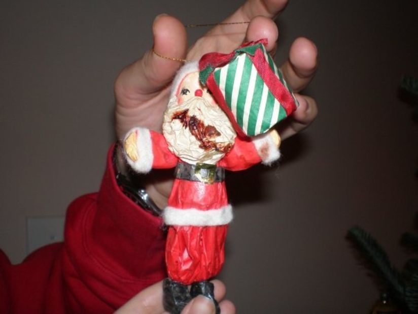 Robyn Shepherd's family has had this Santa ornament for as long as she can remember. A few years ago, they grabbed him out of the bag and saw the red stain. "Rather than throw him out, we hung him on the tree and dubbed him Barfight Santa," she says. "We're not sure where that gory red stain came from, but we like to think that one of the elves was getting a little too jolly with Mrs. Claus, and Santa took one on the kisser."