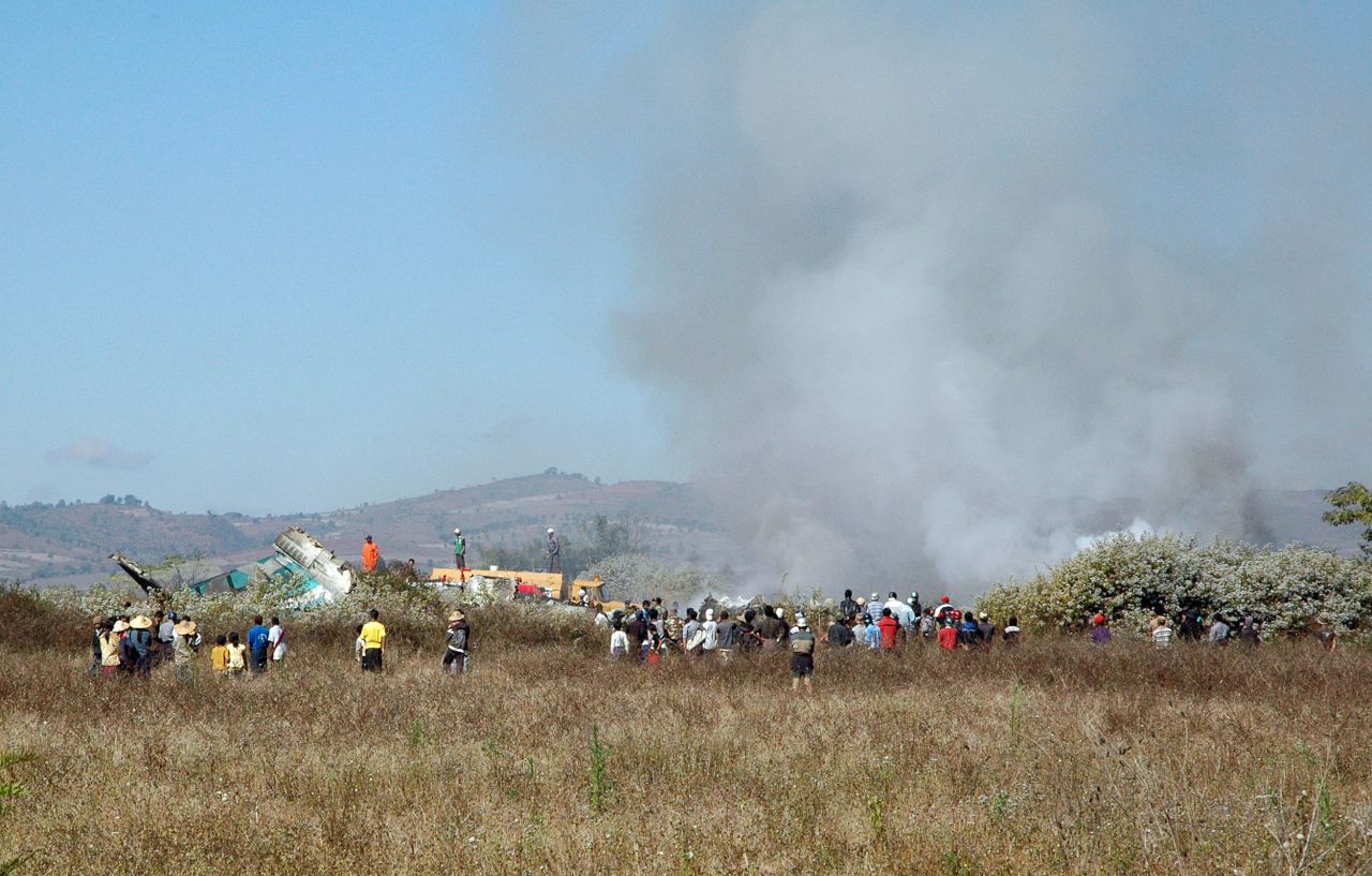 Smoke rises from the scene. The Air Bagan plane was trying to land at Heho Airport but was hampered by heavy fog, the Myanmar Ministry of Information said.