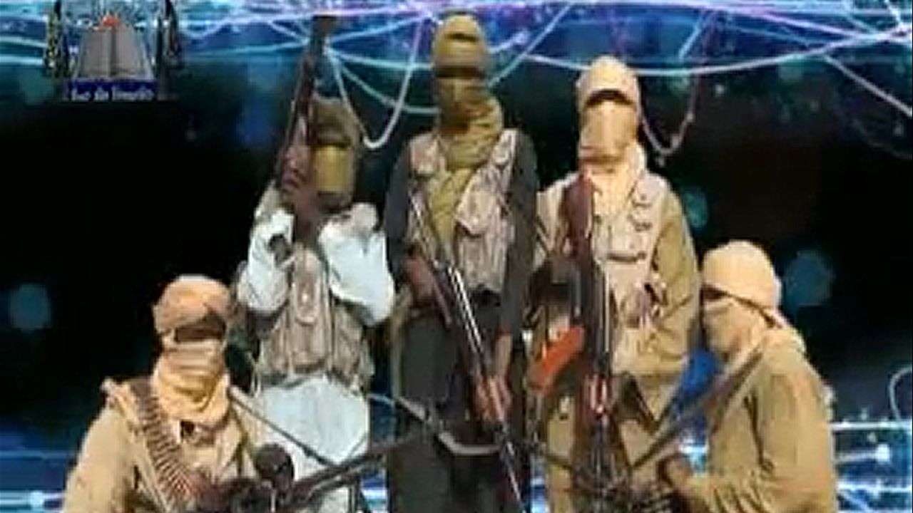 An image released by the radical Islamist group Ansaru reportedly shows  members posing at an undisclosed place in 2012. 