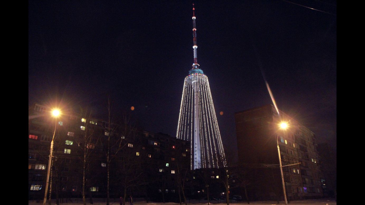 A Christmas tree shaped installation using a TV tower can be seen prior to a lighting up ceremony in Vilnius, Lithuania,