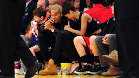 Rihanna and Chris Brown attended an NBA game in Los Angeles, California, on Christmas Day 2012.