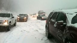 Cars sit at a standstill on Indiana's SR37 near the Morgan and Monroe county line.  Indiana State Troopers report that the road has been cleared, but that roads in the area remain hazardous. 