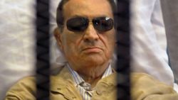 A picture dated on June 2, 2012 shows ousted Egyptian president Hosni Mubarak siting inside a cage in a courtroom during his verdict hearing in Cairo. 