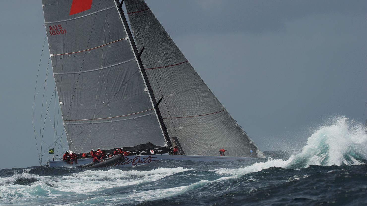 Supermaxi Wild Oats XI enters open water after sailing out of Sydney Harbor in rough conditions on December 26.