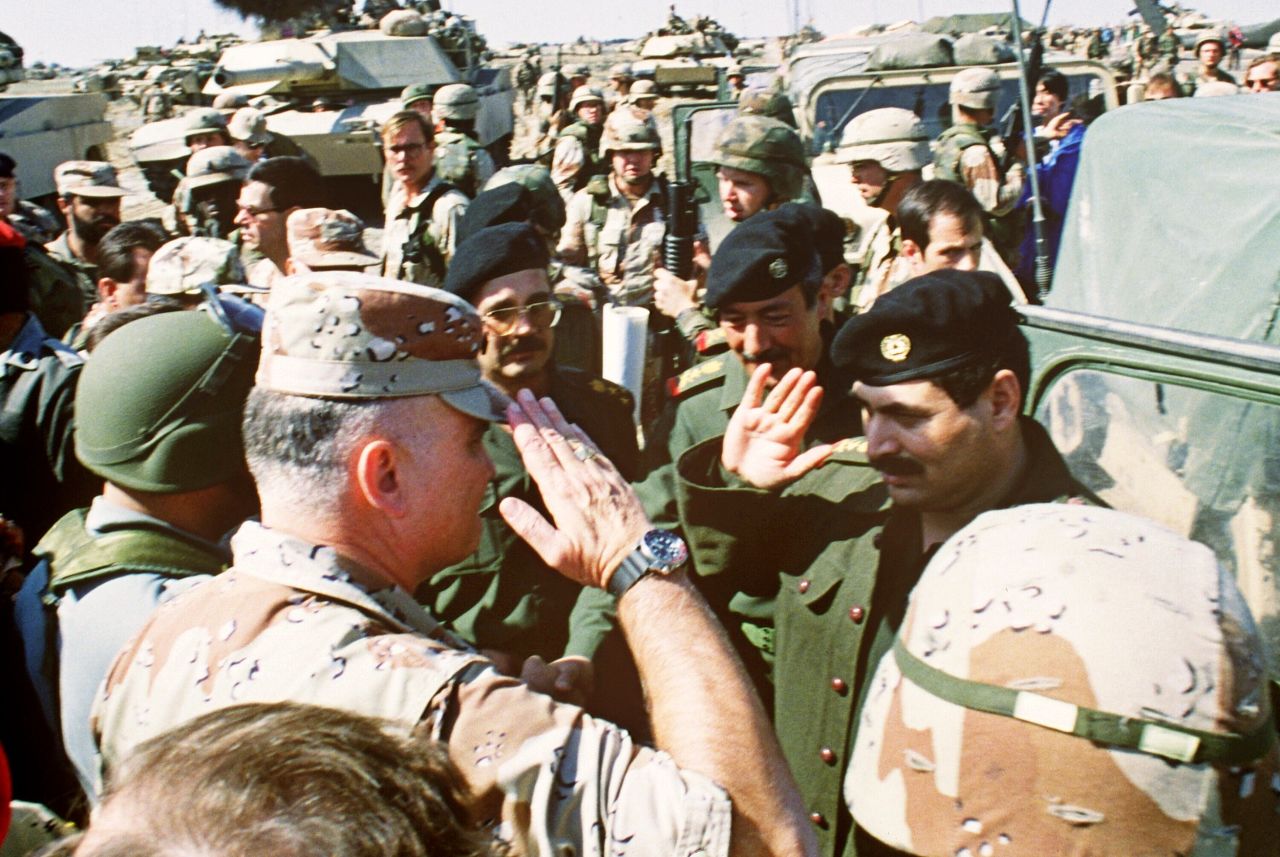 Schwarzkopf salutes Iraqi Lt. Gen. Sultan Hashim Ahmad at the end of their talks to set cease-fire terms in the Gulf War on March 3, 1991, at a captured Iraqi air base.