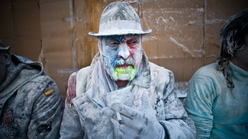 A man takes a break from the battle to smoke on December 28.
