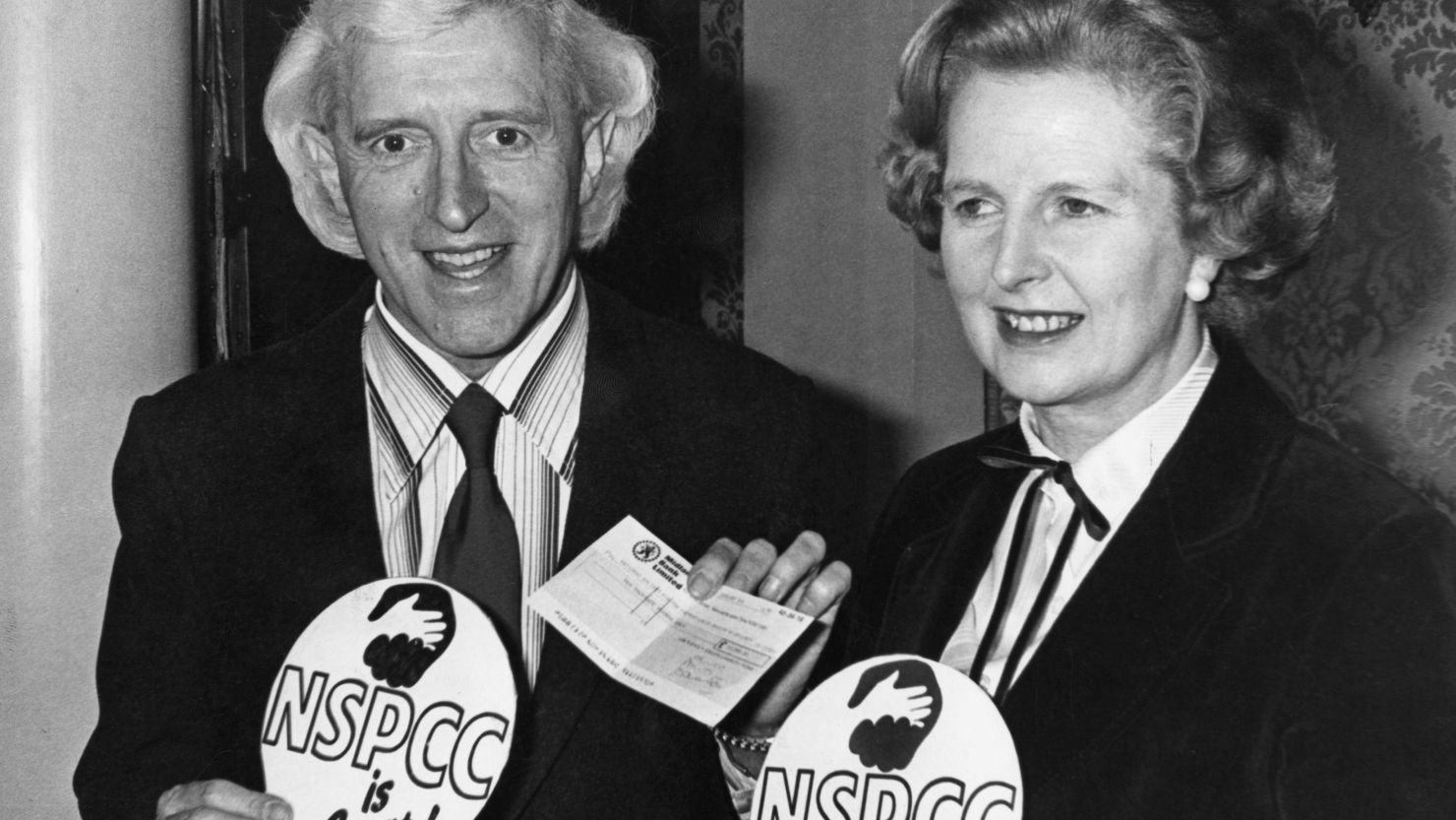 Former British Prime Minister Margaret Thatcher pictured in 1980 with TV host Jimmy Savile.
