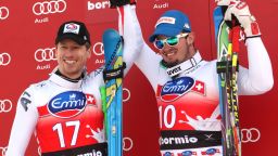 Dominik Paris, right,  and Hannes Reichelt shared victory after finishing in a dead heat in the World Cup downhill at Bormio, Italy. 
