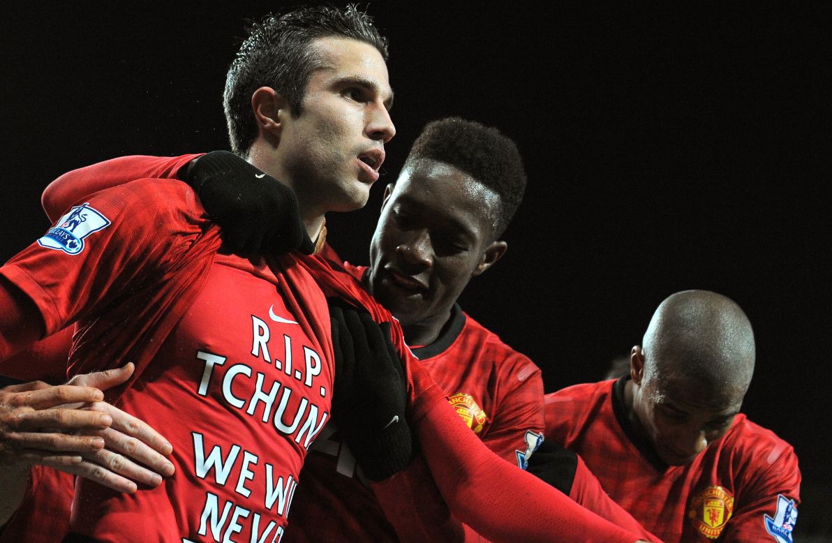 Substitute Robin van Persie (L) celebrates after sealing Manchester United's 2-0 win over with West Brom, scoring his 14th league goal this season.