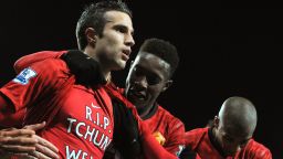 Substitute Robin van Persie (L) celebrates after sealing Manchester United's 2-0 win over with West Brom, scoring his 14th league goal this season.