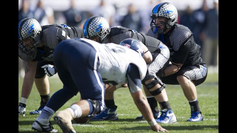 Quarterback Kale Pearson of the Air Force Falcons lines up under center against the Rice Owls during the Bell Helicopter Armed Forces Bowl on December 29 at Amon G. Carter Stadium in Fort Worth, Texas.