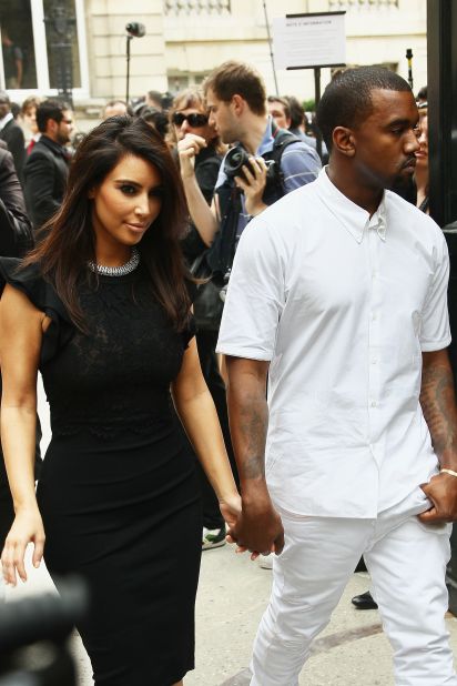 In July 2012, Kim and Kanye kept one another close as they exited the Valentino Haute-Couture Show during Paris Fashion Week.