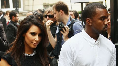 In July 2012, Kim and Kanye kept one another close as they exited the Valentino Haute-Couture Show during Paris Fashion Week.