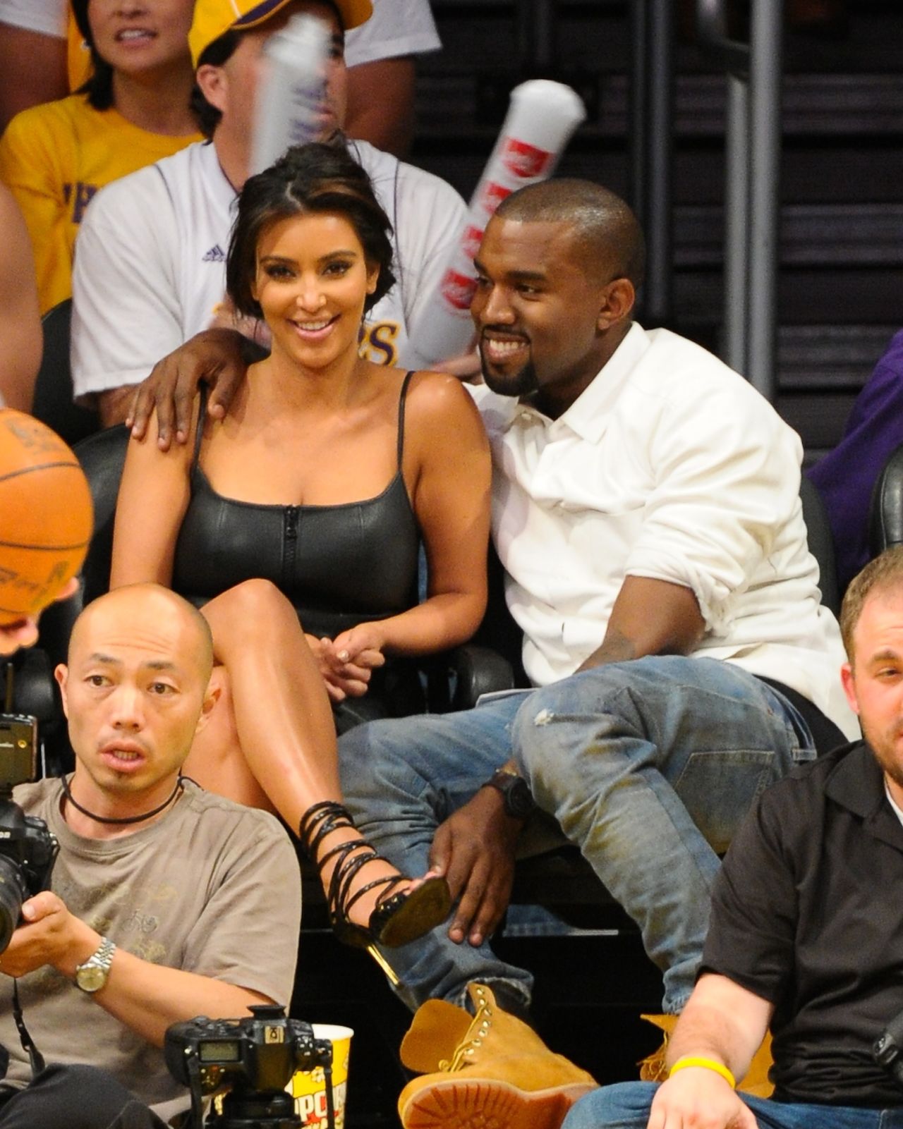 Suspicions that the two were an item were going strong in April 2012 after Kanye's profession of love went viral, and their snuggling at a Lakers game in May of that year bolstered the reports. 