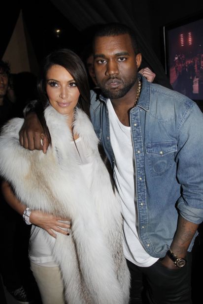 In March 2012, a month <a href="http://marquee.blogs.cnn.com/2012/04/05/kanye-admits-he-fell-in-love-with-kim-k-in-song/" target="_blank">before Kanye told the world he "fell in love with Kim" in a new song</a>, the pair were seen embracing at his Fall/Winter 2012 fashion show in Paris, raising eyebrows about their status.