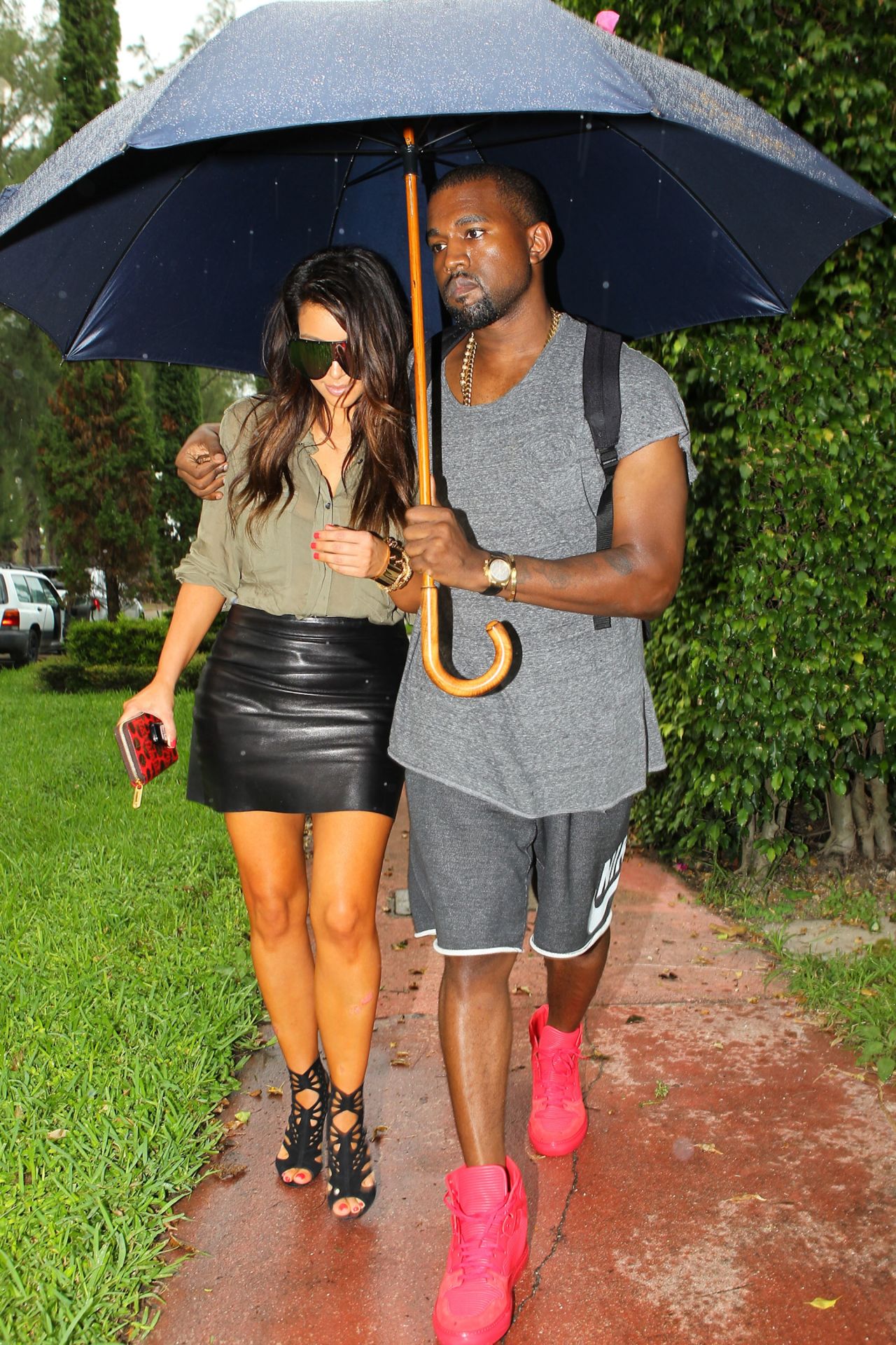 When Kim and Kanye took a romantic, rainy stroll in Miami in October 2012, everything seemed PG at first ... 
