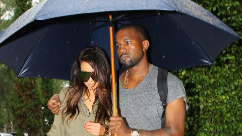 When Kim and Kanye took a romantic, rainy stroll in Miami in October 2012, everything seemed PG at first ...