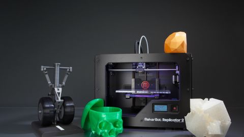 We love the emergence of 3-D printers, such as this MakerBot Replicator 2. But let's make them affordable.