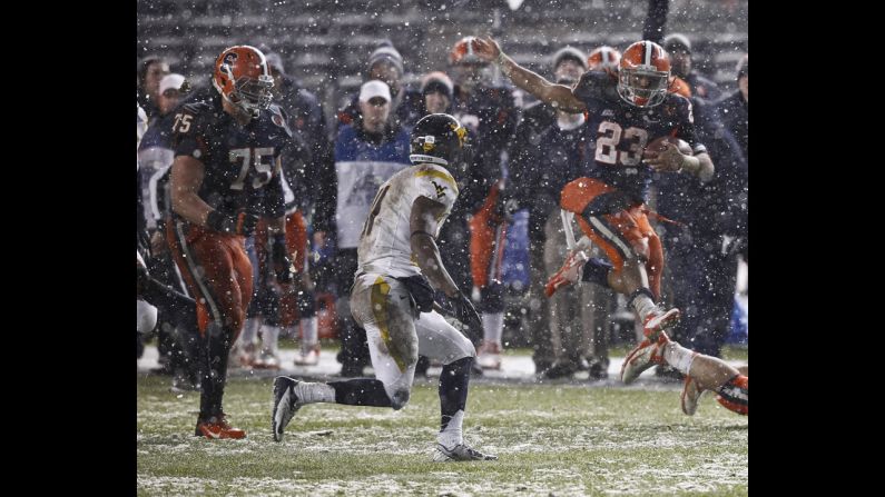Gulley runs the ball against the Mountaineers on December 29.