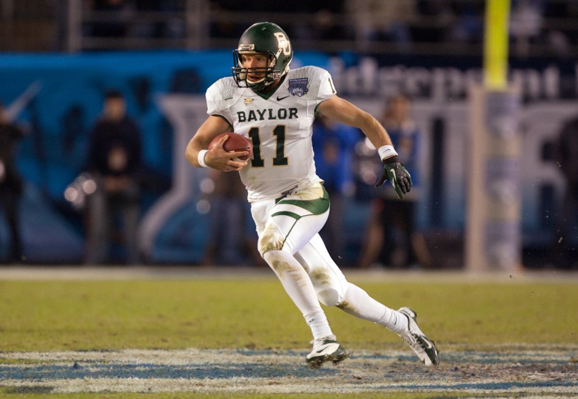 Bears quarterback Nick Florence runs with the ball in the first half of the game against the UCLA Bruins on December 27.