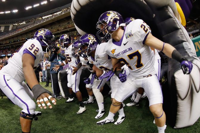 The East Carolina Pirates take the field during the R+L Carriers New Orleans Bowl at the Mercedes-Benz Superdome on December 22 in New Orleans.