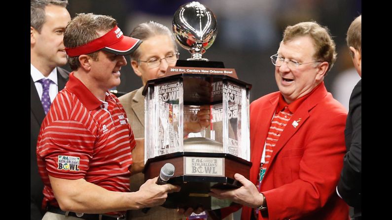 Ragin Cajuns head coach Mark Hudspeth celebrates after defeating the East Carolina Pirates 43-34 on December 22.