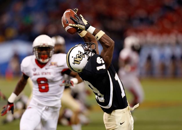 Josh Reese of the Central Florida Knights loses a pass against the Ball State Cardinals during the Beef 'O' Brady's Bowl at Tropicana Field on Friday, December 21, in St. Petersburg, Florida.