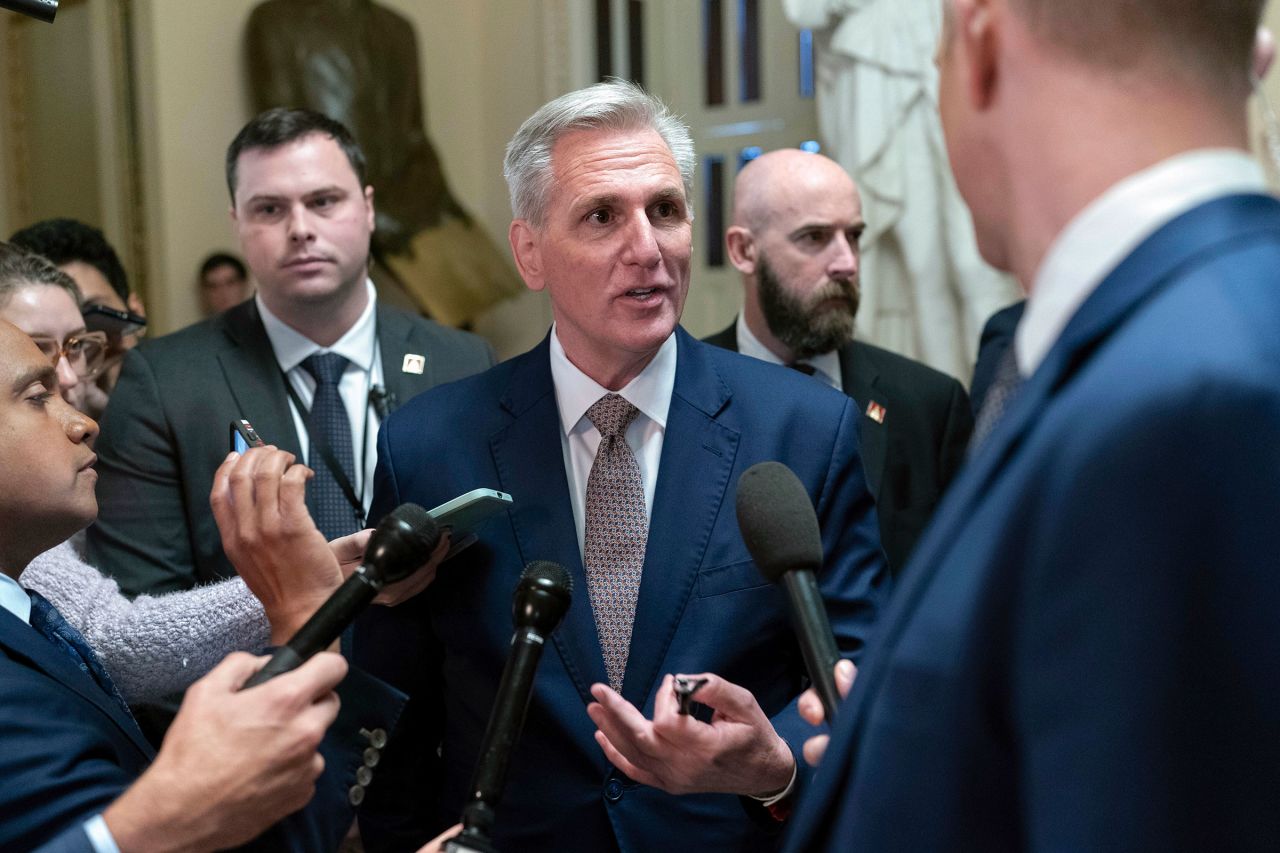 Former Speaker of the House Rep. Kevin McCarthy speaks to reporters as he leaves the House chamber after Republicans failed in their first attempt to elect Rep. Jim Jordan to be the new House speaker, at the Capitol in Washington, DC, on Tuesday.