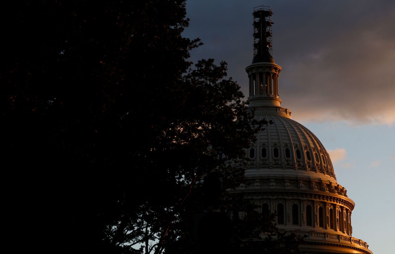 Evening light illuminates the US Capitol Building in Washington, DC, on September 30. 