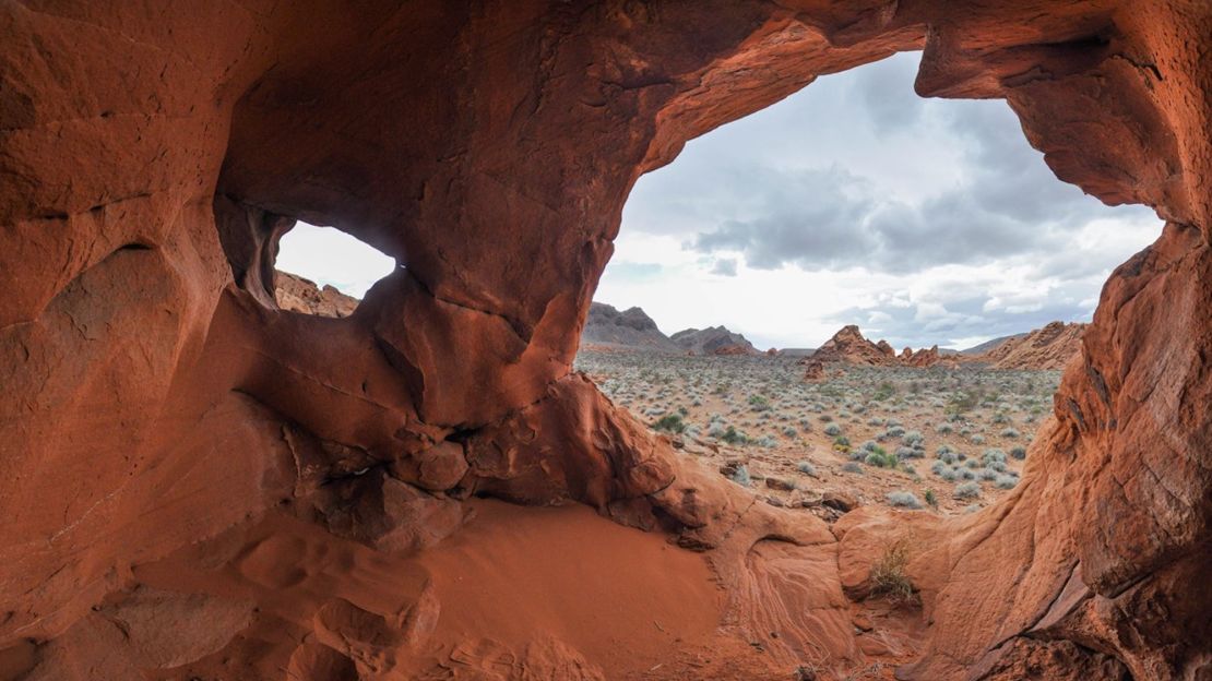 Sculptural rock formations along the Redstone Dune Trail look out over Lake Mead National Recreation Area.