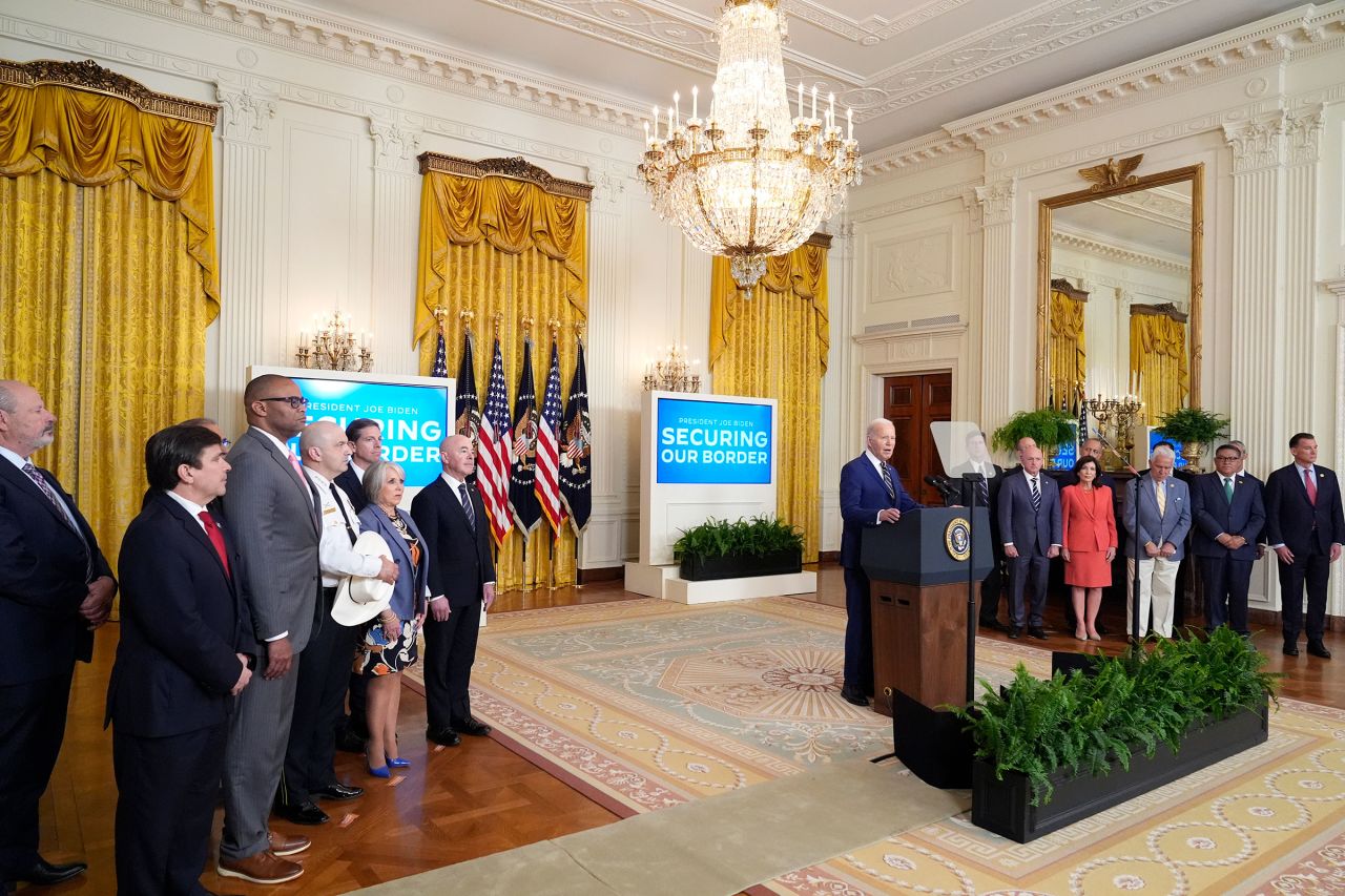 President Joe Biden, center, speaks about an executive order in the East Room at the White House in Washington, DC, on Tuesday, June 4. 