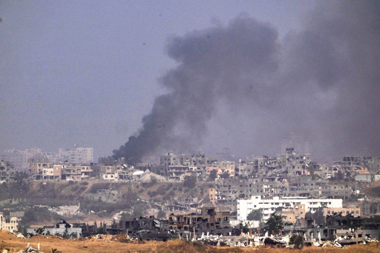 Smoke rises to the sky after an explosion in Gaza, as seen from southern Israel, on May 21.