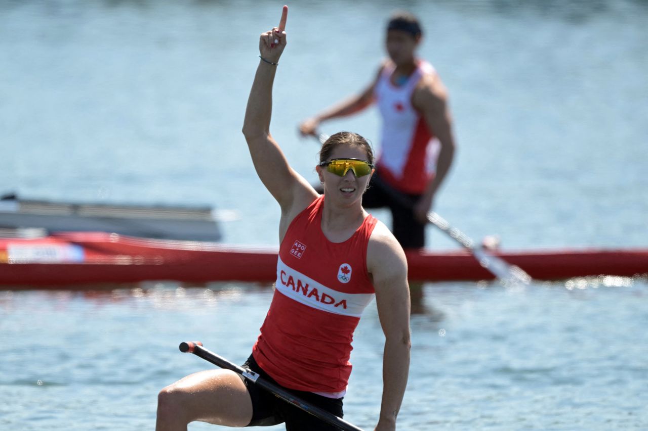 Canada's Katie Vincent celebrates winning gold in the women's canoe single 200-meter final on August 10. 