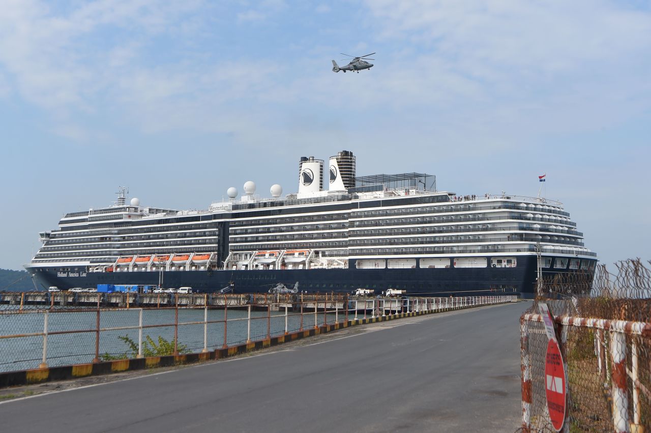 A helicopter takes off next to the Westerdam cruise ship in Sihanoukville, Cambodia.