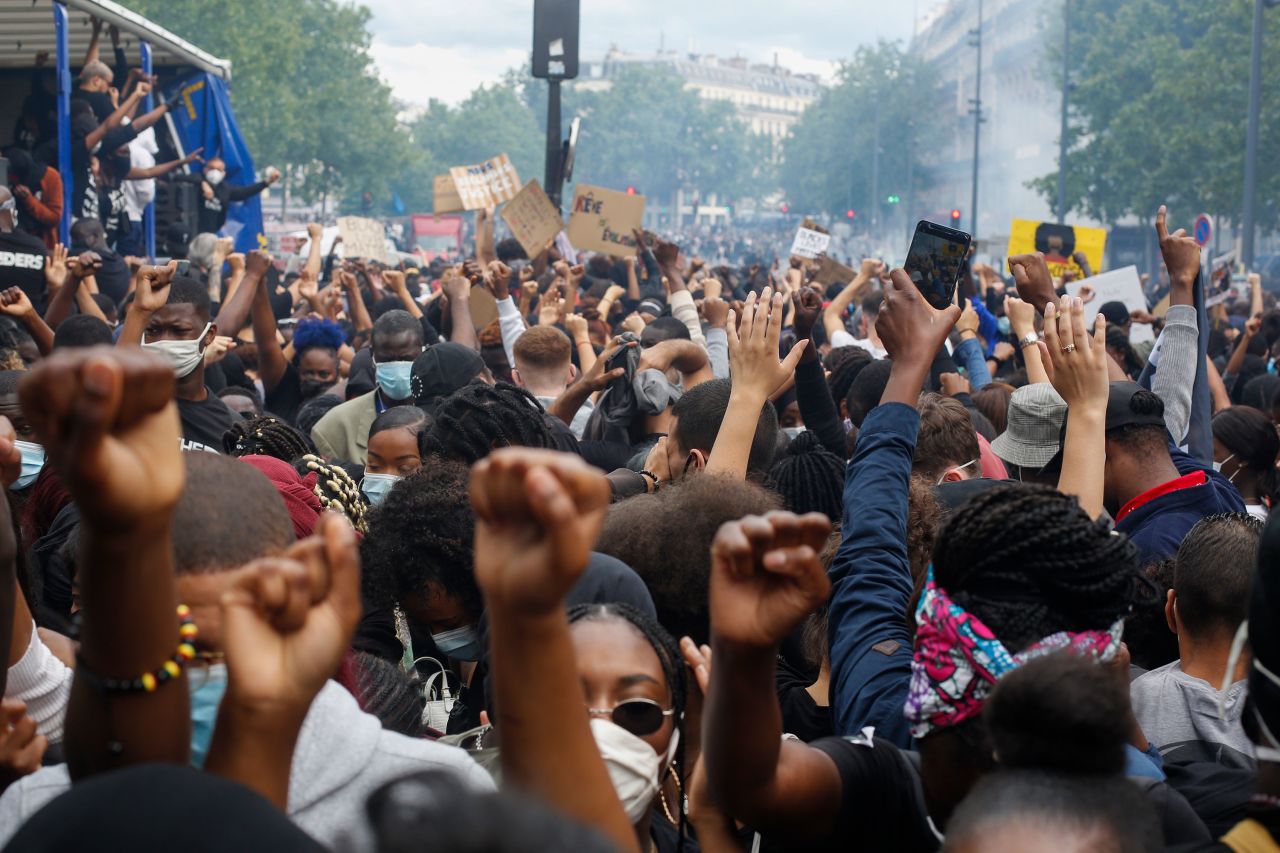 Thousands of people take part in a demonstration against police brutality and racism in Paris on Saturday, June 13.