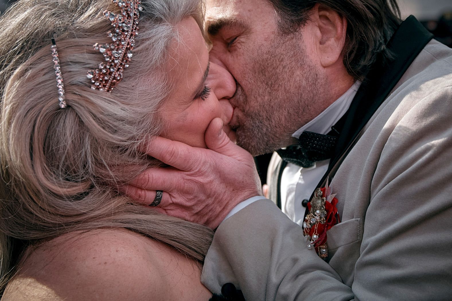A couple kisses as they get married in New York during a “Love in Times Square" event on Valentine's Day, Friday, February 14.
