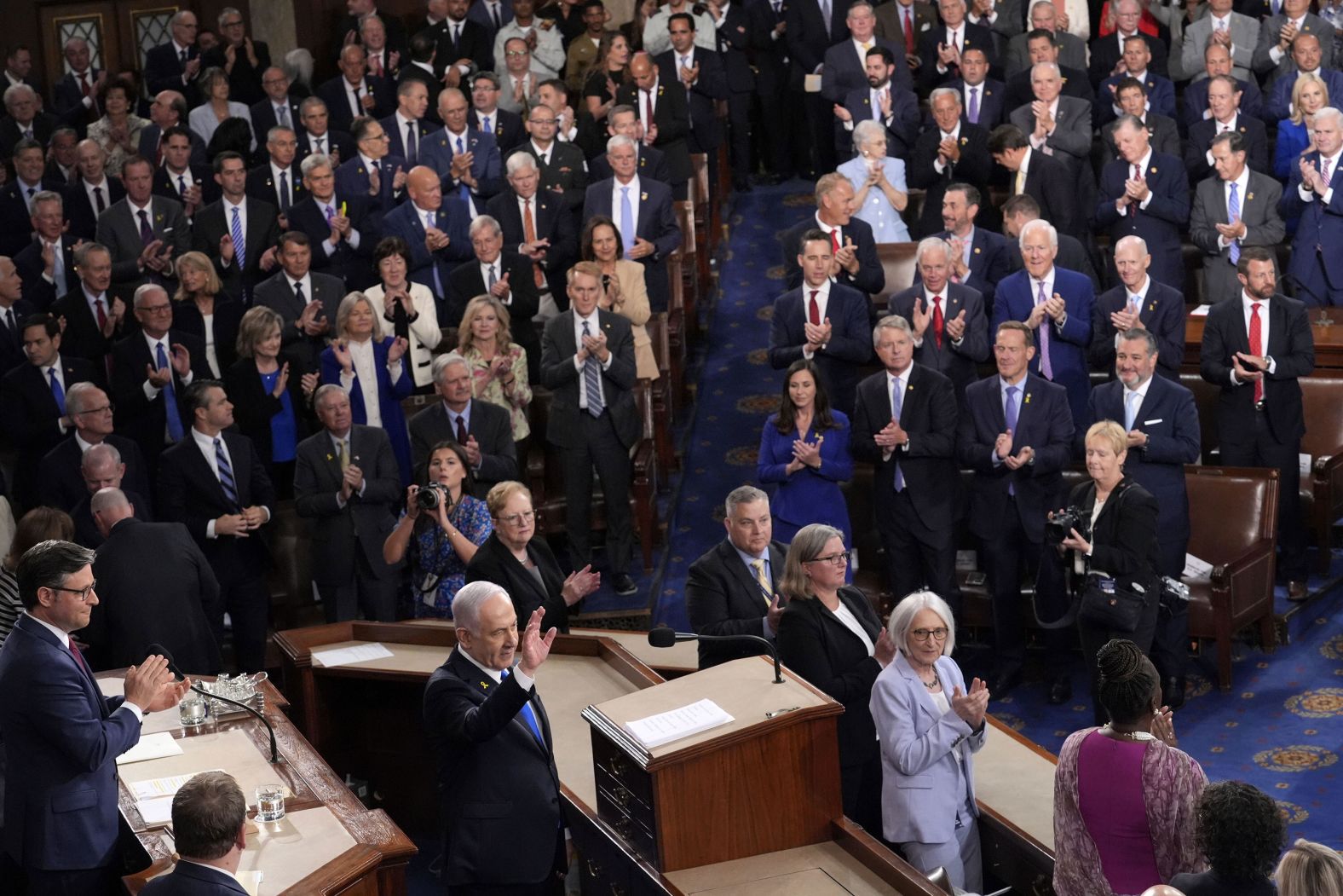 Israeli Prime Minister Benjamin Netanyahu waves as he arrives to speak to a joint meeting of the US Congress on Wednesday, July 24. During <a href="index.php?page=&url=https%3A%2F%2Fwww.cnn.com%2F2024%2F07%2F24%2Fpolitics%2Fbenjamin-netanyahu-address-washington%2Findex.html">his nearly hourlong address</a>, he lashed out against protests of Israel’s ongoing war against Hamas in Gaza, broadly disparaging anti-Israel protesters as “Iran’s useful idiots.” He struck a bellicose tone as he vowed to “fight until we achieve victory.”