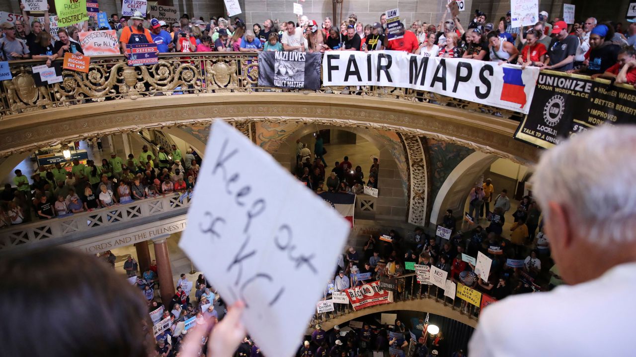 Protestors gather in the rotunda to protest a redistricting plan that would split Kansas City into three districts on Wednesday, Sept. 10, 2025, at the Missouri State Capitol, in Jefferson City, Mo. (Yong Li Xuan/Missourian via AP)