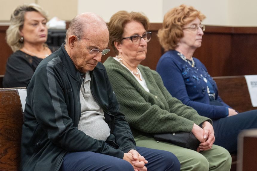 Harvey Adelson hangs his head as the guilty verdict is read for his wife, Donna Adelson, on Thursday.