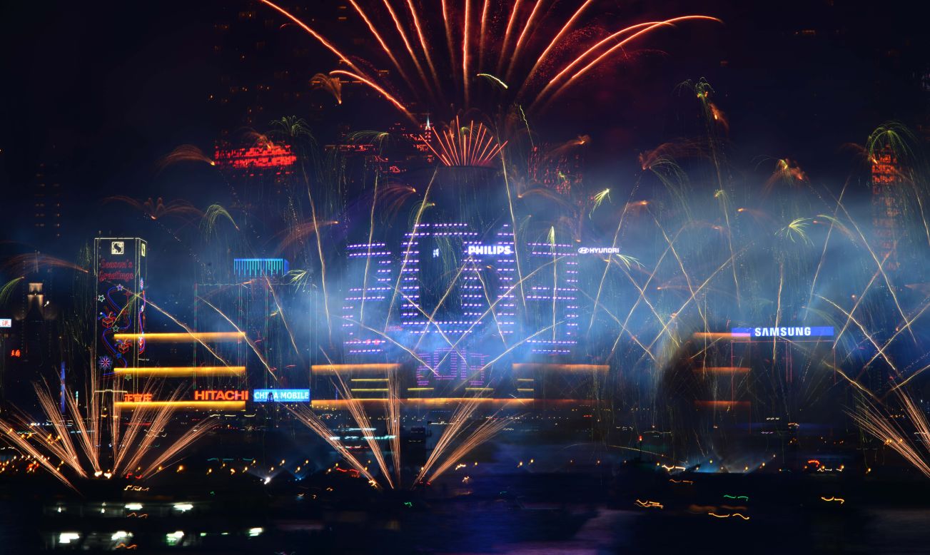 Fireworks explode over Victoria Harbour to celebrate the new year in Hong Kong.