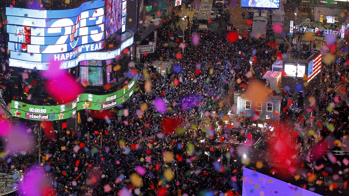Confetti is dropped on revelers at midnight during New Year celebrations in Times Square in New York on Tuesday, January 1.