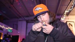 A small but passionate crowd of marijuana enthusiasts celebrated New Year's Eve at the grand opening of Denver's first private cannabis club.