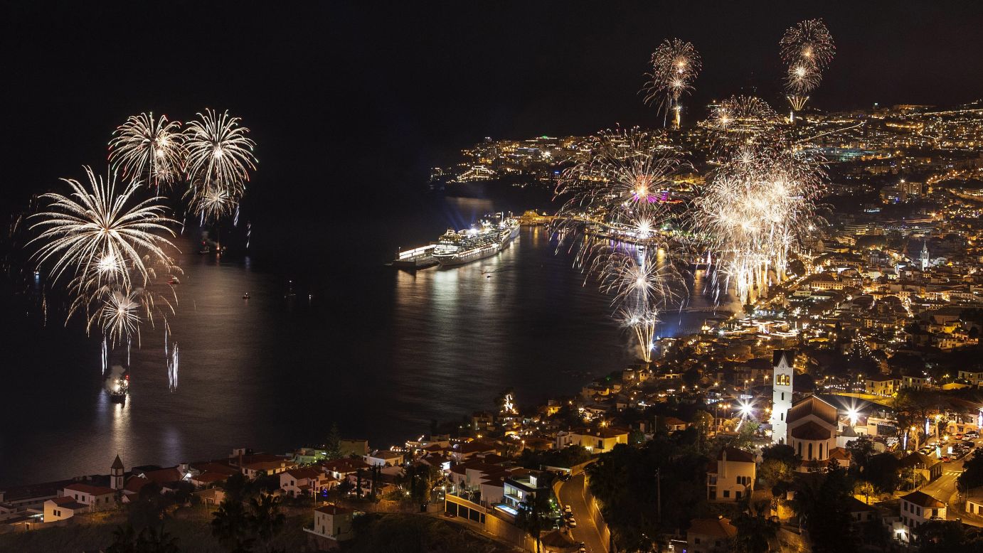 Fireworks light up the sky above Funchal Bay, Madeira Island, to celebrate the arrival of the new year in Portugual.