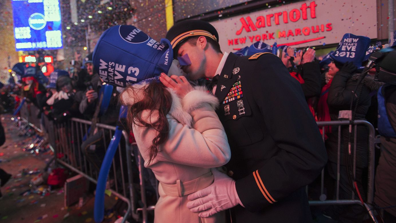 National Guardsman John Cebak kisses his fiancee, Sonja Babic, at the start of the new year in New York's Times Square.