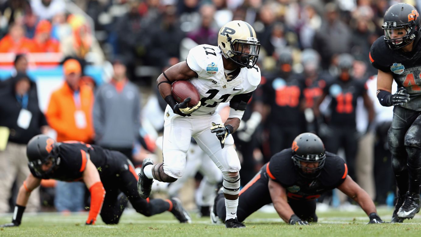 Akeem Hunt of the Purdue runs the ball against Oklahoma State on Tuesday.