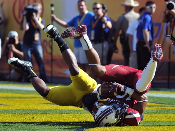 Wide receiver Damiere Byrd of the South Carolina Gamecocks catches a 56-yard touchdown pass against the Michigan Wolverines on January 1.