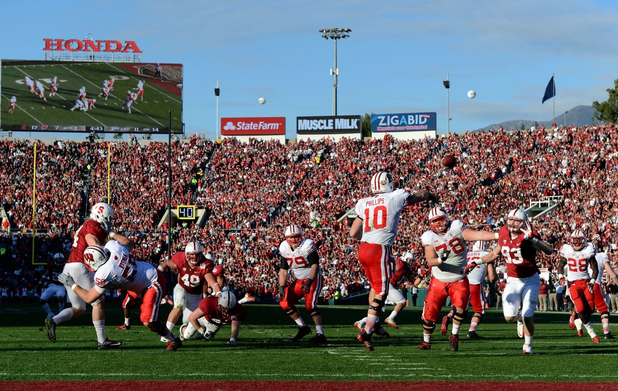 Quarterback Curt Phillips of the Wisconsin Badgers makes a pass in the second quarter against the Stanford Cardinal in the 99th Rose Bowl Game Presented by Vizio on January 1 at the Rose Bowl in Pasadena, California.
