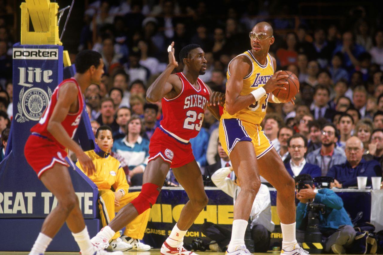 Abdul-Jabbar, No. 33, found transitioning from player to private citizen a challenge. Here, he posts up during a game against the Philadelphia 76ers in 1987.